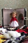 Lillian Vernon - Doll with 8 Outfits and Personalized Trunk